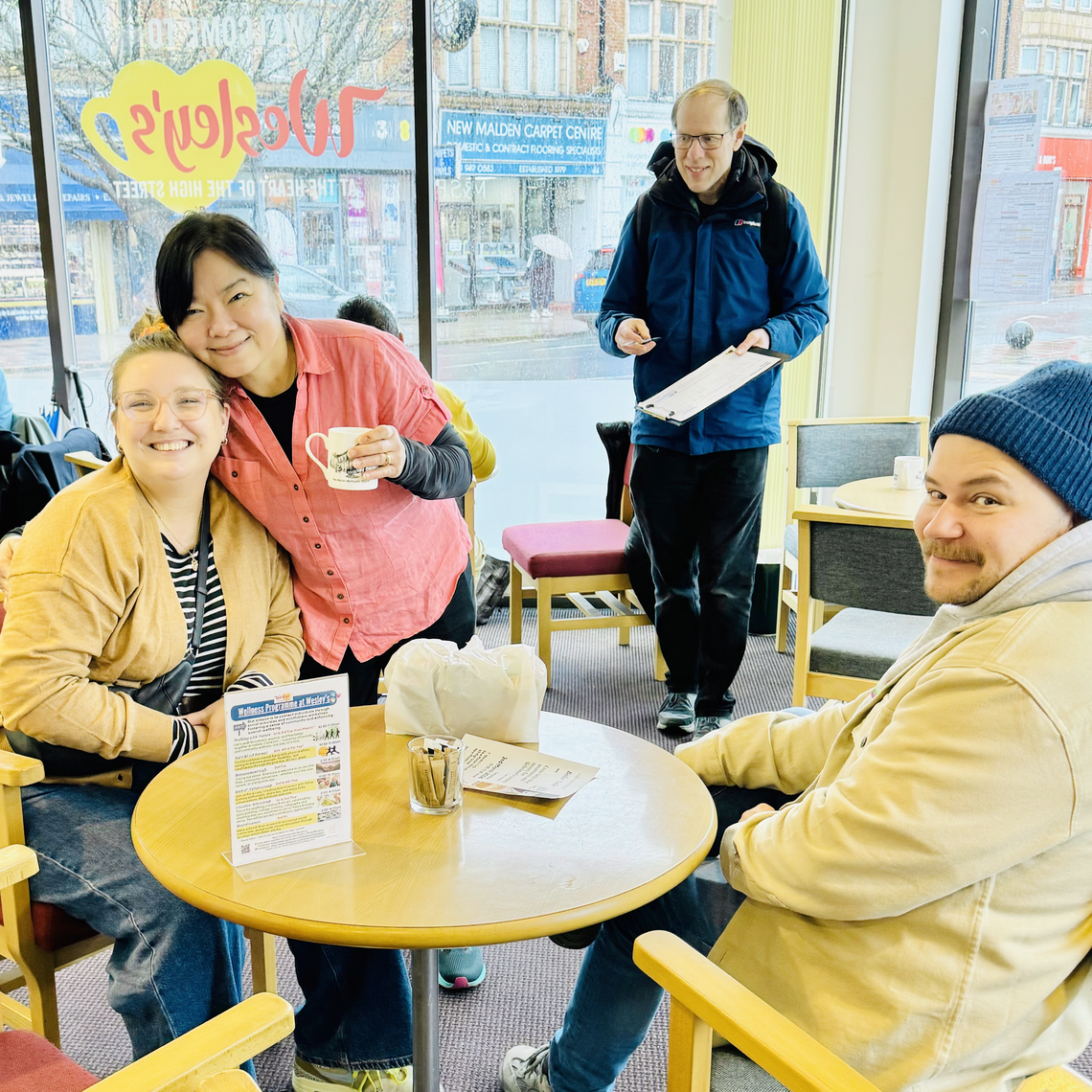 Lee with cafe customer
